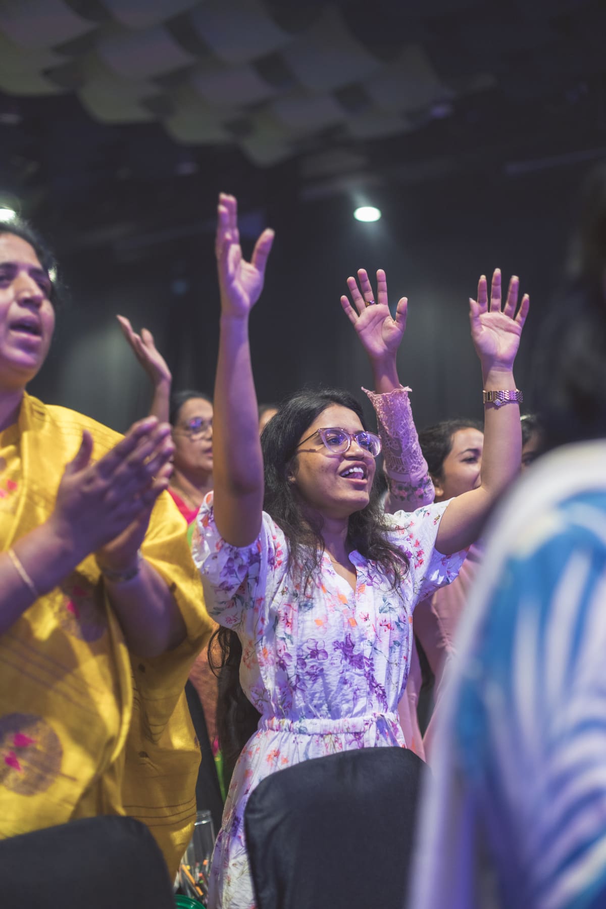 Women celebrating with joy at a church gathering