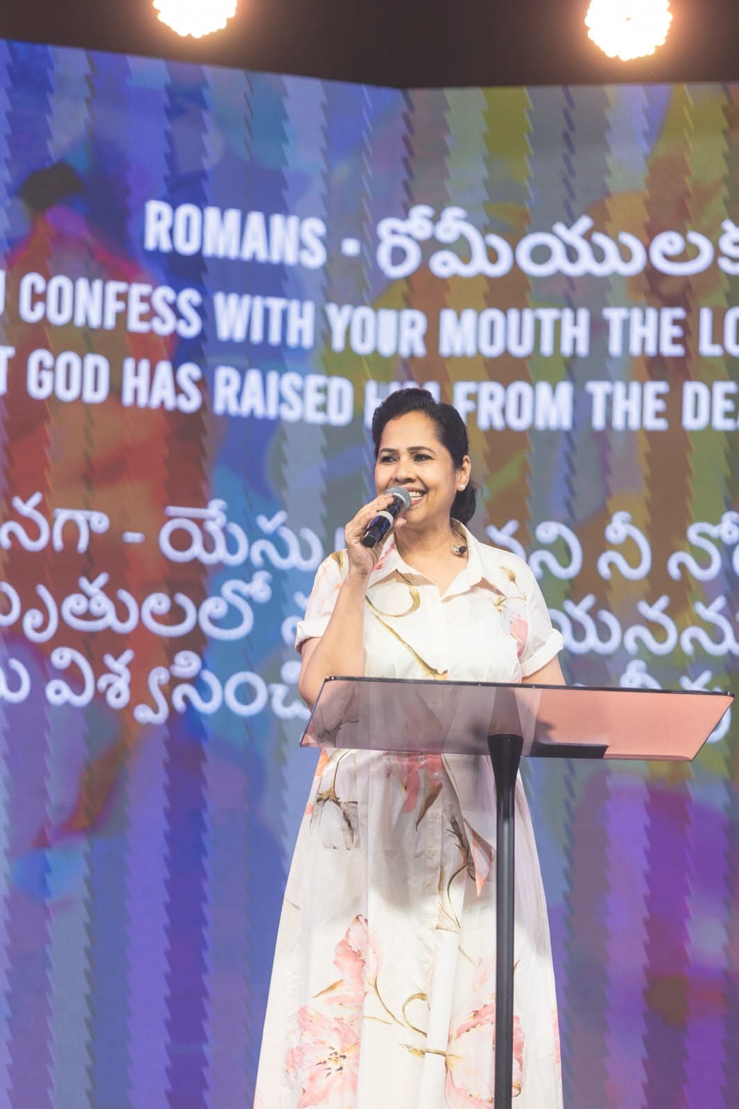 A woman listening during a teaching moment with an open Bible